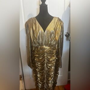 Gold metallic mini dress with puffed sleeves